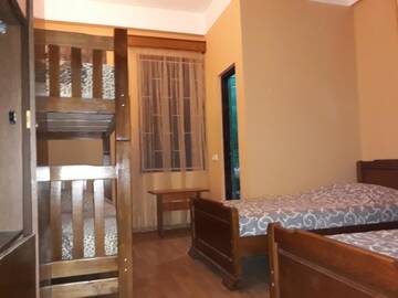 Фото номера Четырехместный номер &quot;Комфорт&quot; Гостевой дом Suliko Guest House г. Махинджаури 7