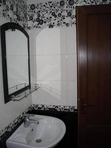 Фото номера Двухместный номер Делюкс с 1 кроватью Гостевой дом Suliko Guest House г. Махинджаури 16