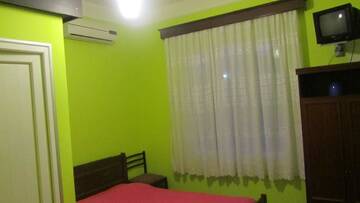 Фото номера Трехместный номер Делюкс Гостевой дом Suliko Guest House г. Махинджаури 18
