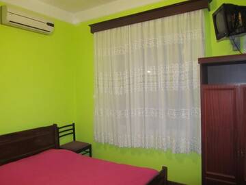 Фото номера Трехместный номер Делюкс Гостевой дом Suliko Guest House г. Махинджаури 7