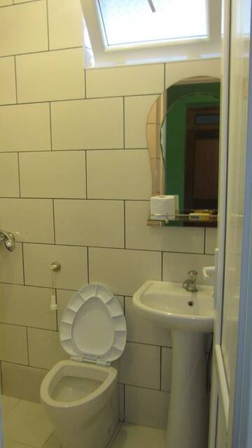 Фото номера Трехместный номер «Комфорт» Гостевой дом Suliko Guest House г. Махинджаури 7