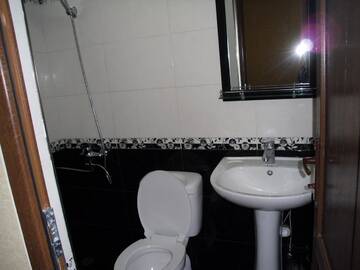 Фото номера Двухместный номер Делюкс с 1 кроватью Гостевой дом Suliko Guest House г. Махинджаури 10
