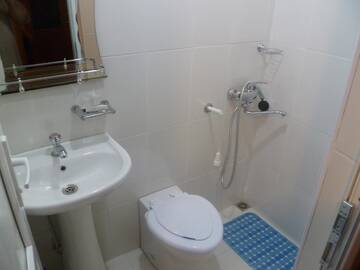 Фото номера Трехместный номер Делюкс Гостевой дом Suliko Guest House г. Махинджаури 12