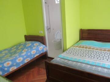 Фото номера Трехместный номер Делюкс Гостевой дом Suliko Guest House г. Махинджаури 15
