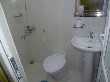Фото номера Трехместный номер Делюкс Гостевой дом Suliko Guest House г. Махинджаури 16